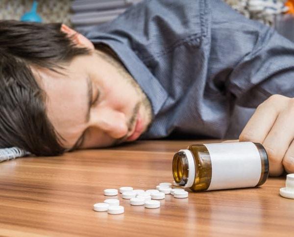 How to Prevent Prescription Drug Addiction Picture of a man who has overdosed on prescription drugs